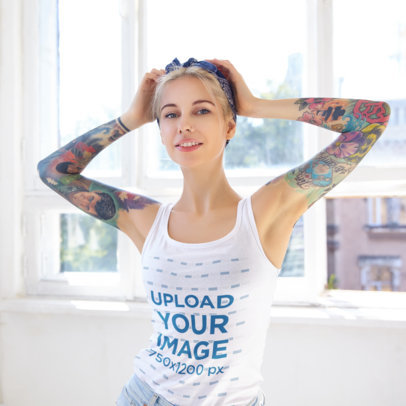 Tank Top Mockup of a Blonde Woman with Tattooed Arms