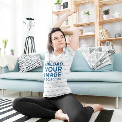 Sublimated T-Shirt Mockup of a Woman Doing Yoga at Home