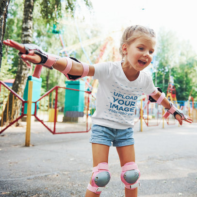 V-Neck Tee Mockup of a Little Girl Skating at a Park