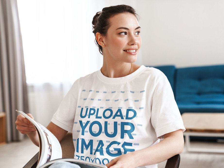 Unisex T-Shirt Mockup of a Woman Reading at Home 