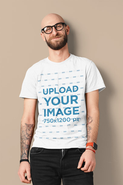 T-Shirt Mockup of a Happy Bearded Man With Arm Tattoos 