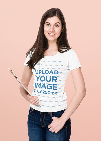T-Shirt Mockup Featuring a Woman with a Clipboard at a Studio 