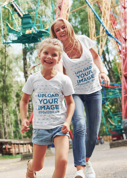 T-Shirt Mockup of a Girl Having Fun with Her Mom at an Amusement Park