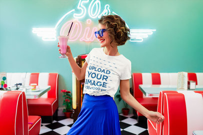 T-Shirt Mockup Featuring a Woman with a Milkshake at a Retro Restaurant