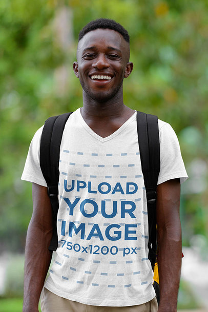 V-Neck Tee Mockup of a Happy Man Traveling 