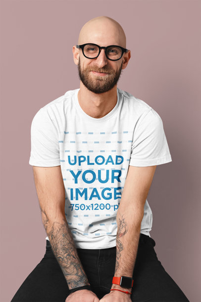 Mockup of a Happy Bearded Man Wearing a Basic T-Shirt at a Studio 
