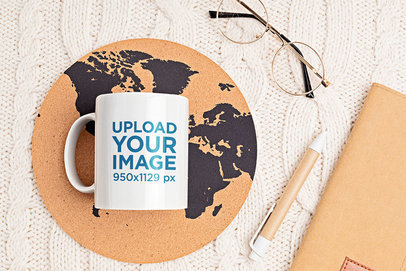 11 oz Coffee Mug Mockup Placed Near a Pair of Glasses