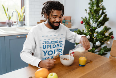 Sweatshirt Mockup Featuring a Happy Man Eating Breakfast