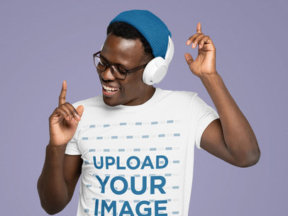 T-Shirt Mockup Featuring a Man with Glasses Listening to Music m1793-r-el2