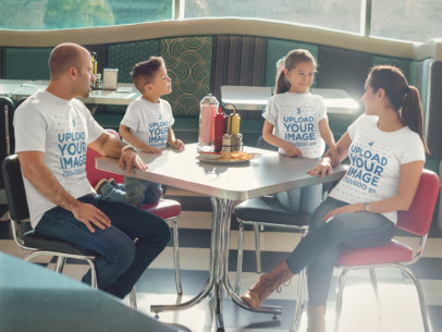 Mockup of a Family at a Restaurant Having Lunch and Wearing Different T-Shirts