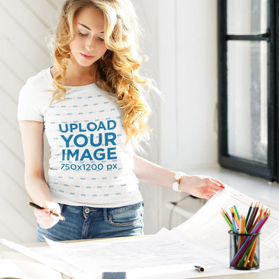T-Shirt Mockup Featuring a Young Architect at Work M1699-r-el2