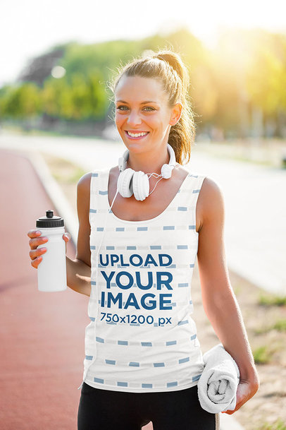 Tank Top Mockup of a Woman Relaxing After Working Out at a Park