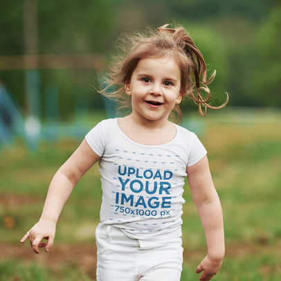 T-Shirt Mockup of a Happy Girl Running