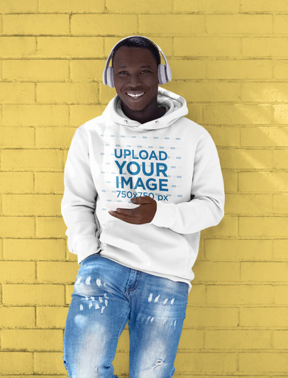 Hoodie Mockup of a Man Listening to Music While Leaning on a Colored Wall M2146-r-el2