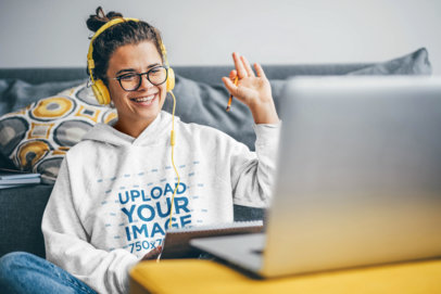 Hoodie Mockup of a Happy Woman Doing a Video Call