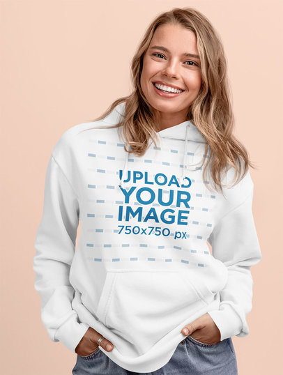Front-View Mockup of a Pullover Hoodie Featuring a Smiling Woman at a Studio m2371-r-el2