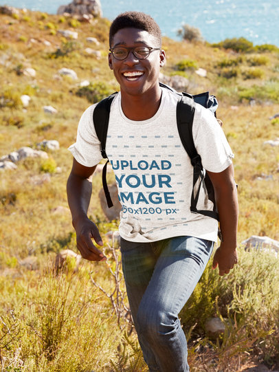Heather Tee Mockup of a Happy Man on a Hike