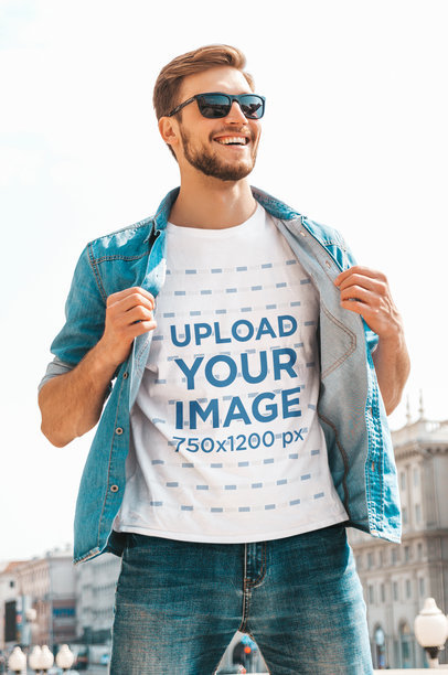 T-Shirt Mockup of a Bearded Man with Sunglasses Posing at a City