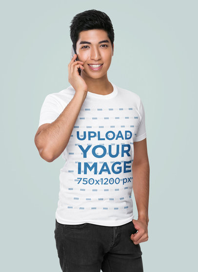 Basic T-Shirt Mockup of a Man Making a Call in a Studio 