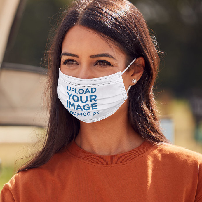 Closeup Mockup of a Smiling Woman with a Face Mask