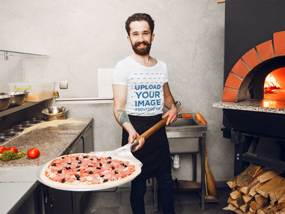 T-Shirt Mockup of a Bearded Man Baking a Pizza