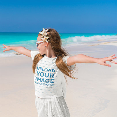 T-Shirt Mockup Featuring a Happy Girl at the Beach