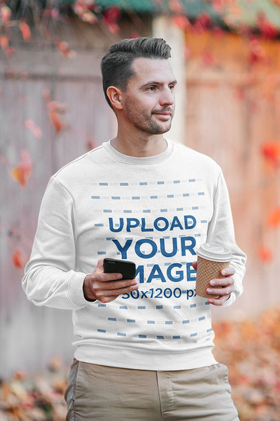 Sweatshirt Mockup of a Man Holding a Phone and a Coffee 