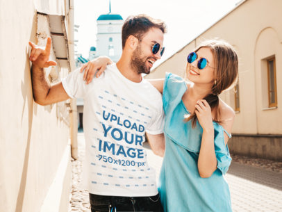 T-Shirt Mockup of a Bearded Man Hugging His Girlfriend on a Sunny Day