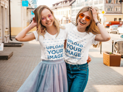 Tee Mockup of Two Smiling Friends Hanging Out in a City M1597-r-el2