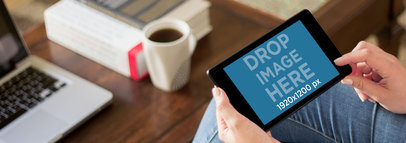 Mockup of a Black Nexus 7 Held by A Woman