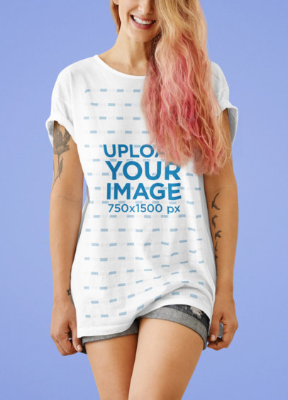 Mockup of a Woman Wearing a Loose T-Shirt in a Studio