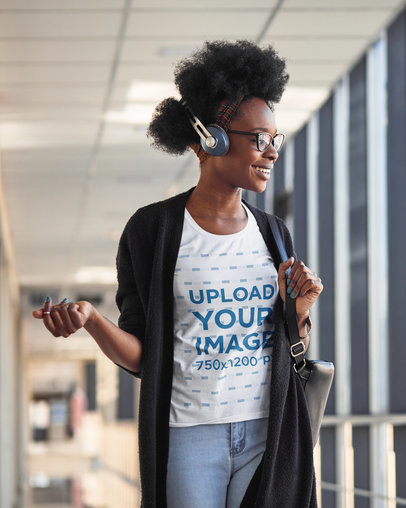 T-Shirt Mockup of a Happy Woman with Headphones