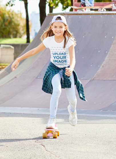 T-Shirt Mockup of a Happy Girl Skating at a Park