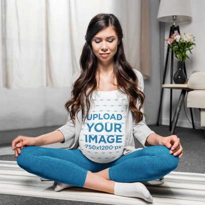 T-Shirt Mockup of a Pregnant Woman Meditating at Home 