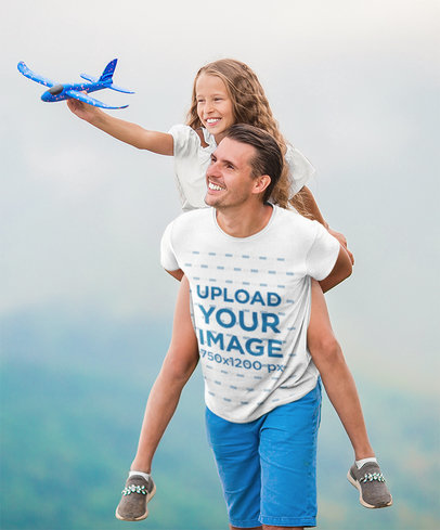 T-Shirt Mockup of a Happy Dad Carrying His Daughter on His Back T-Shirt Mockup of a Happy Dad Carrying His Daughter on His Back 