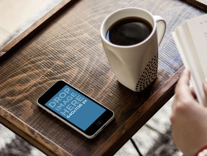 Mockup of an iPhone 5C in a Wooden Tray