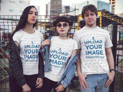 Three Young Friends Wearing Tshirts Template with Different Designs in the City