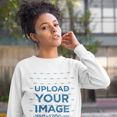 Mockup of a Curly-Haired Woman Wearing a Heathered Sweatshirt 