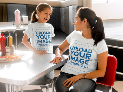 Mother and Daughter Wearing Different Tshirts Mockup While at a Diner Restaurant