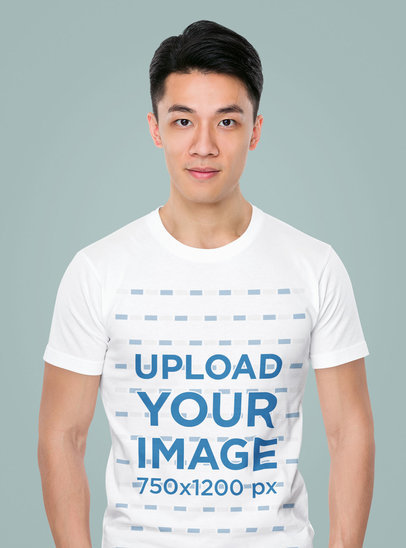 T-Shirt Mockup of a Serious Man Against a Colored Backdrop 