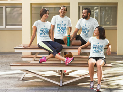 Group of Four Happy Friends Chatting After Workout Wearing Different T-Shirts Mockup a15633