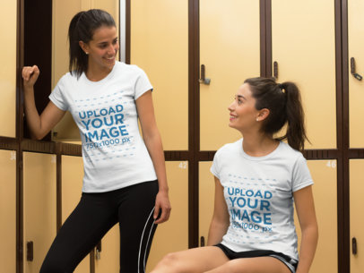Two Girlfriends Talking in the Dressing Room and Wearing Different T-Shirts Mockup