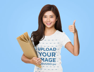 T-Shirt Mockup of a Happy Woman Holding Some Paper Binders 