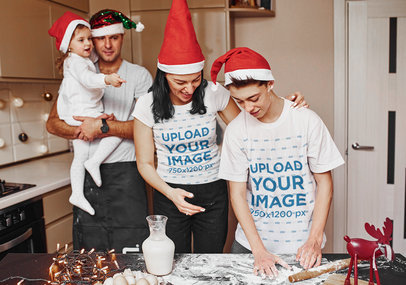 T-Shirt Mockup Featuring a Happy Family in Christmas Hats Cooking at Home m2148 r-el2