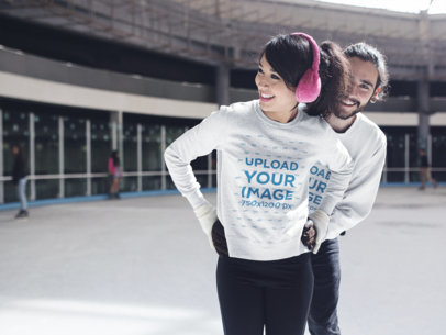 Couple Wearing Crewneck Sweatshirts Mockup with Different Designs While Skating a15593