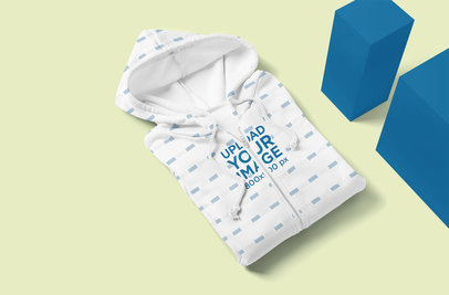 Mockup of a Folded Sublimated Hoodie by Some Blocks