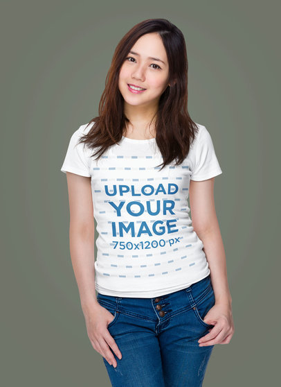 Mockup of a Woman Posing with Jeans and a Tee at a Studio