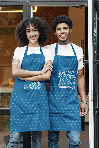 Apron Mockup Featuring Two Waiters Posing Outside a Restaurant
