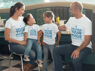 Family of Four Having a Reunion at a Restaurant While Wearing Different T-Shirts Mockup