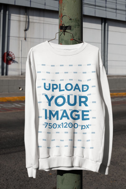 Mockup of a Sweatshirt Hanged on an Urban Lamppost M458